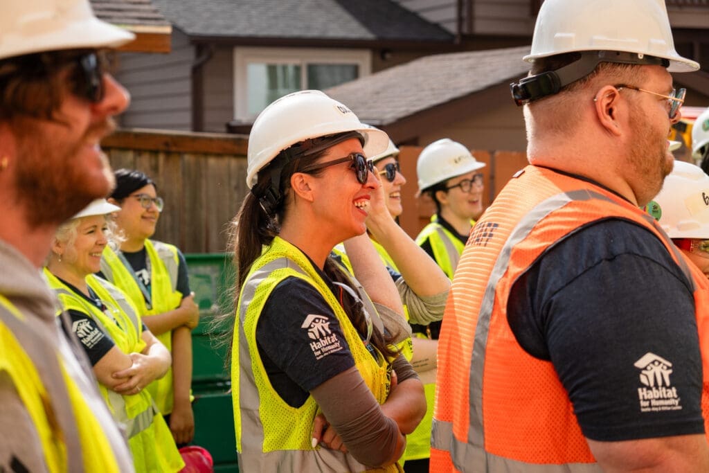 Habitat for Humanity Seattle staff gathered together on a residential construction build day