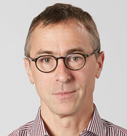 Aerial view of forested watershed with river running through valley